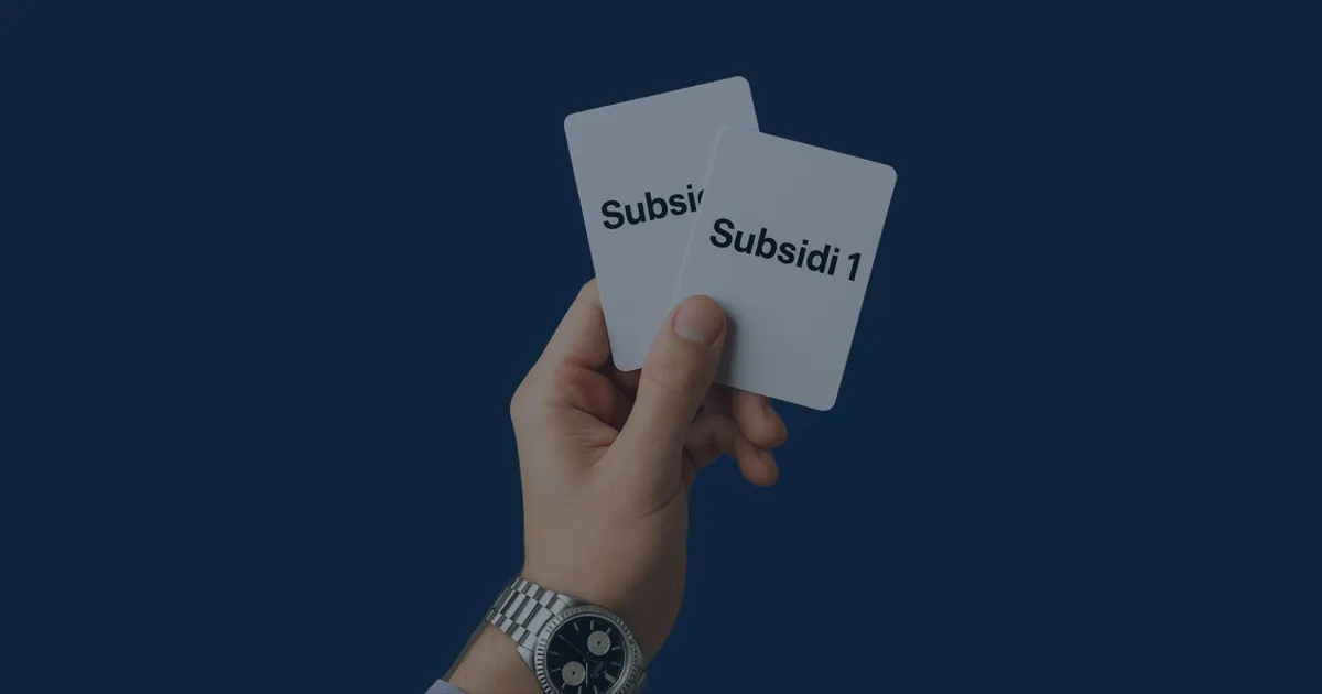 Ilustrasi tangan memegang kartu subsidi - NEXT Indonesia Center.jpg